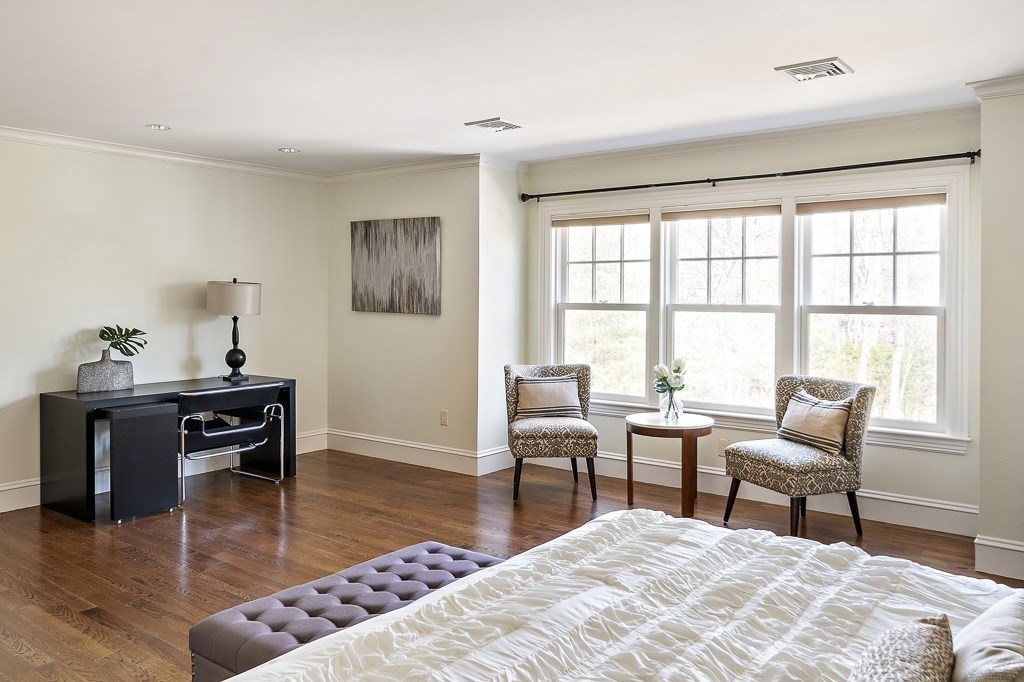 17 Kesseler Way Newton, MA 02467 - Photo 18 of 33 a bedroom with furniture and a wooden floor