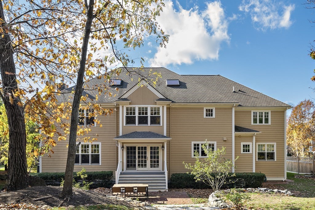 17 Kesseler Way Newton, MA 02467 - Photo 31 of 33 a front view of a house with a tree