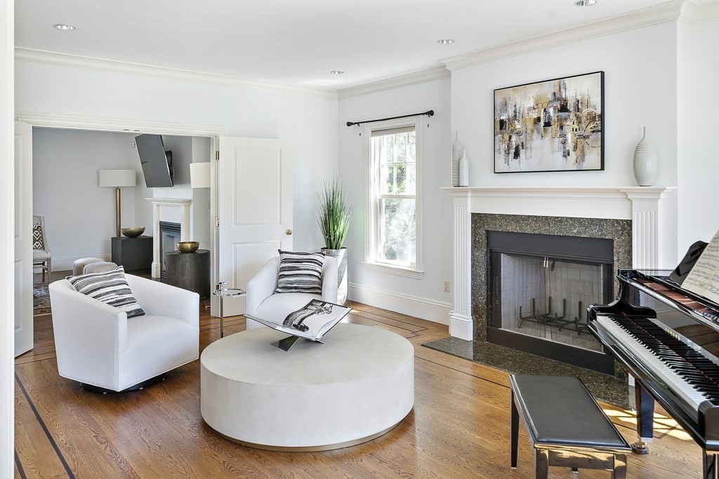 17 Kesseler Way Newton, MA 02467 - Photo 10 of 33 a living room with furniture and a fireplace