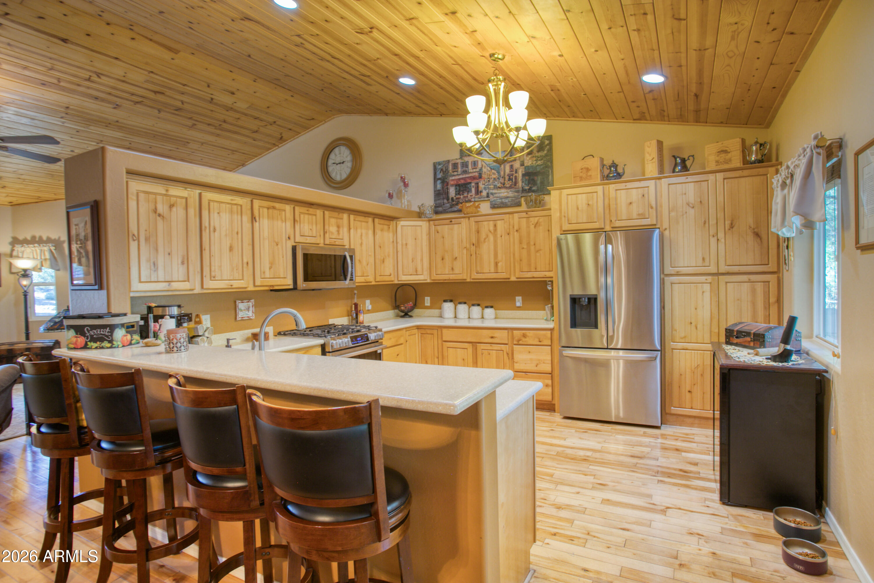 925 Wild Horse Road Show Low, AZ 85901 - Photo 11 of 40 a kitchen with refrigerator a stove a sink and dishwasher
