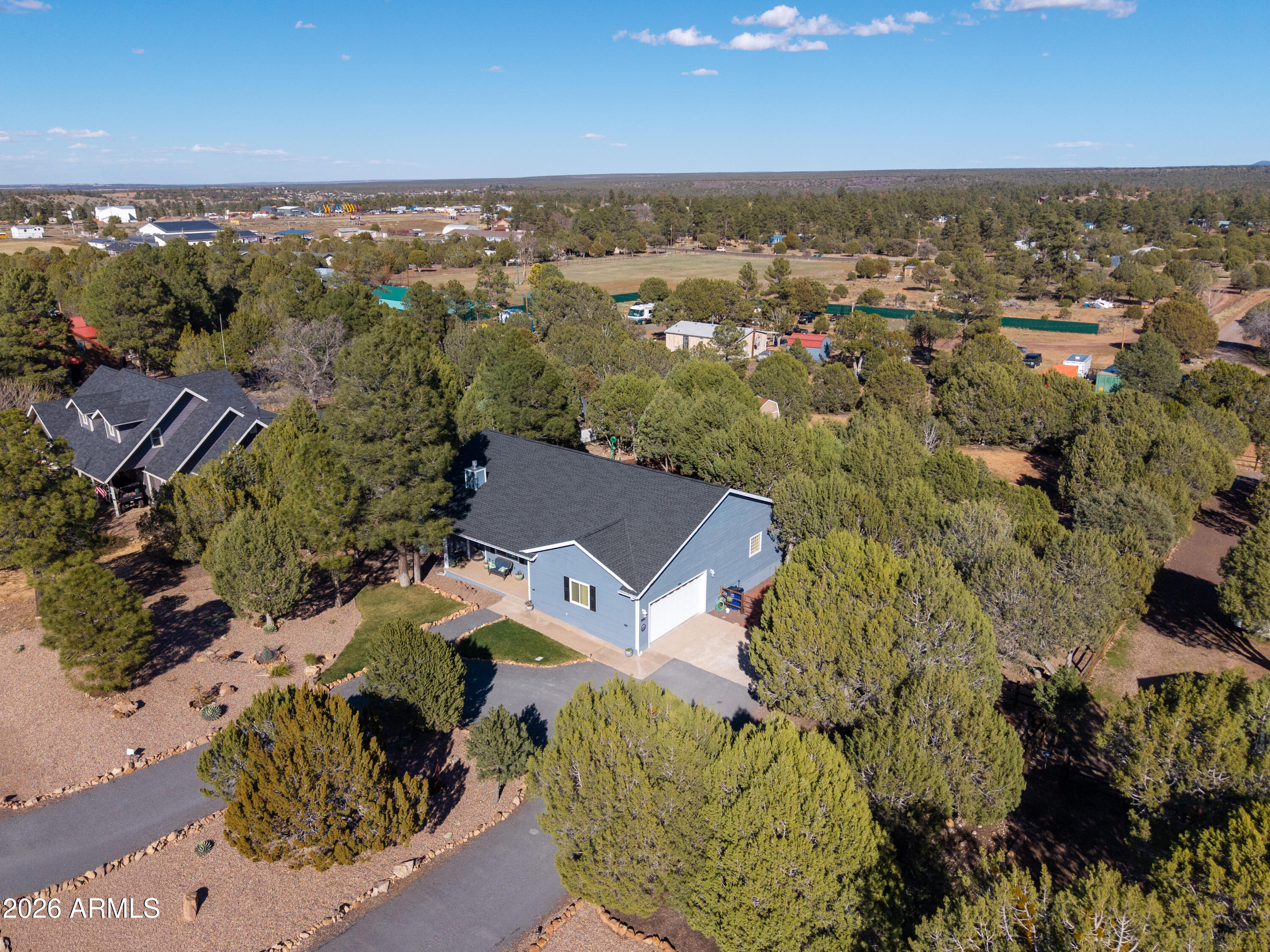 925 Wild Horse Road Show Low, AZ 85901 - Photo 30 of 40 an aerial view of a house with a lake view