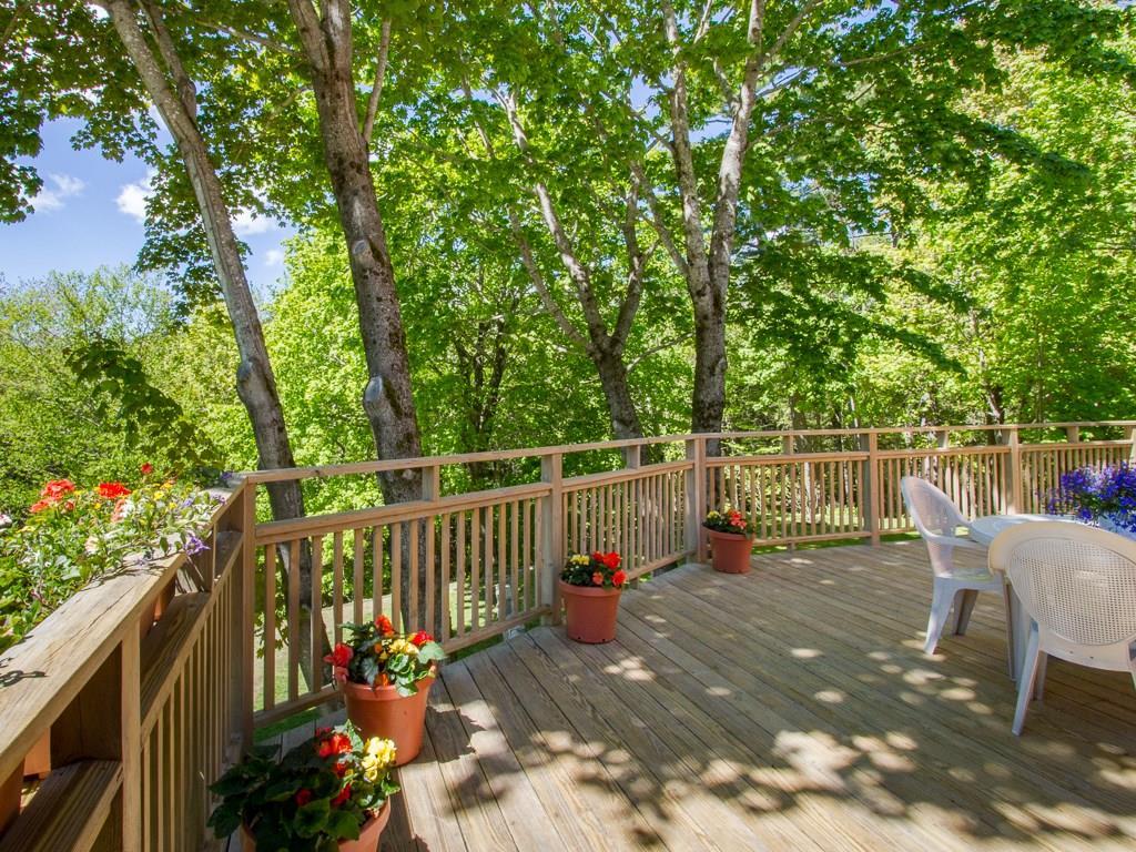 10 Jordan Pond Road Seal Harbor, ME 04675 - Photo 27 of 32 A large deck offers outdoor space...