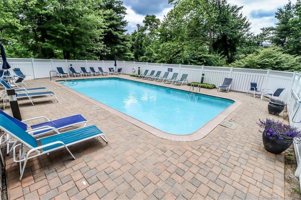 14 Strathmore Lane, Unit 14 Norwalk, CT 06880 - Photo 3 of 5 swimming pool view with a seating space