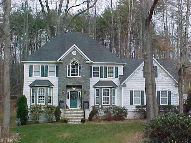 6597 Currieton Drive Oak Ridge, NC 27310 - Photo 1 of 9 Exterior Front.