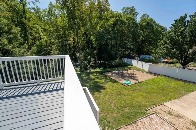 a view of a backyard with a deck