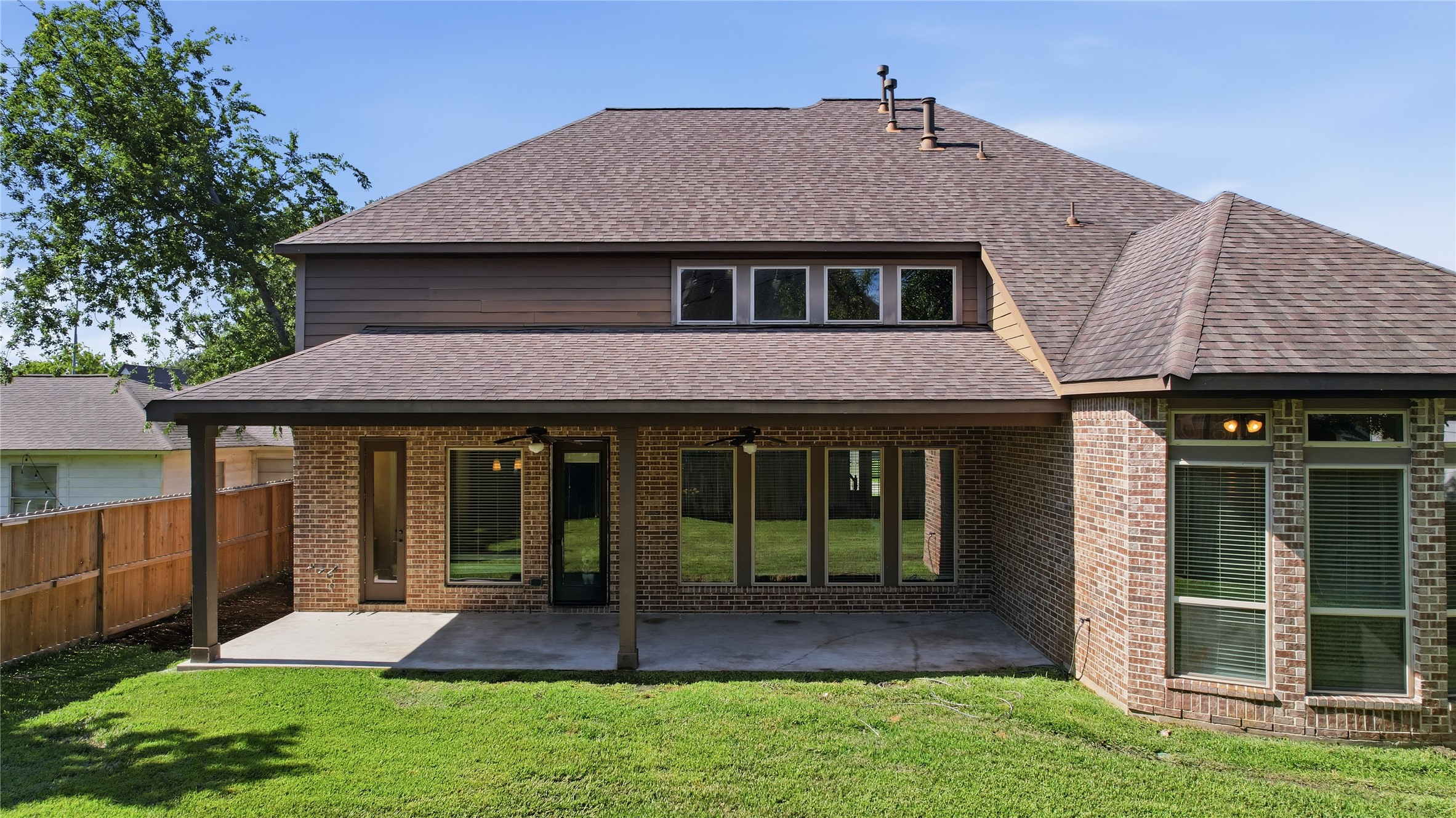 6429 Remlap Street Houston, TX 77055 - Photo 26 of 30 Expansive backyard and covered patio create an ideal setting for gatherings, play, and year-round outdoor living.