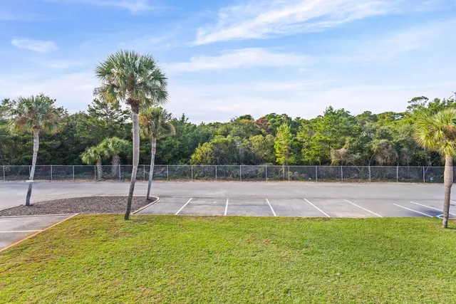 a backyard of a house with lots of green space