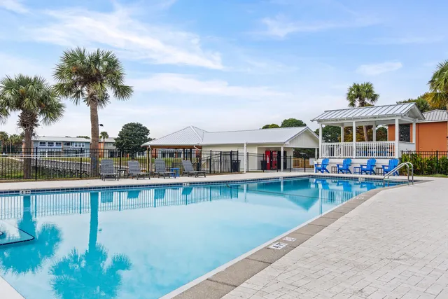 a front view of a house with lake view
