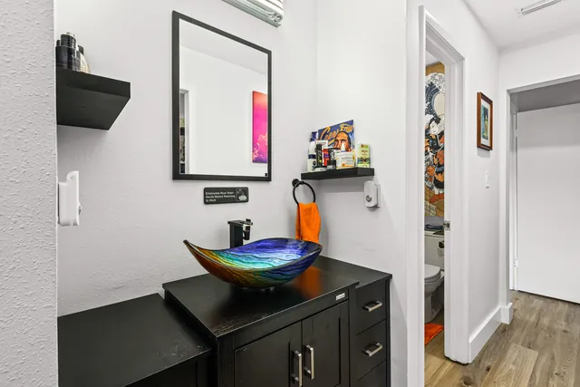 a room with furniture and wooden floor