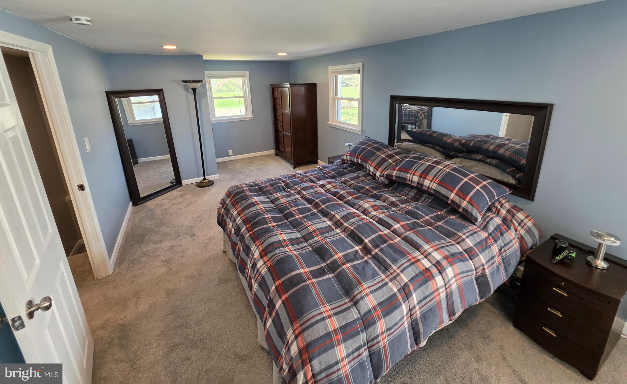 142 New Road Horsham, PA 19044 - Photo 21 of 38 a bedroom with a bed and a mirror on dresser