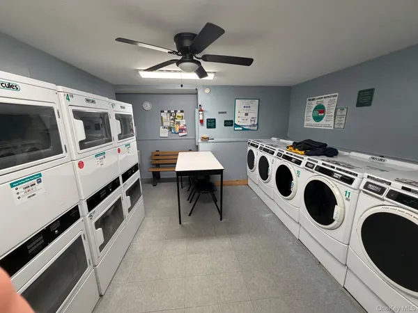 a view of kitchen and electric stove