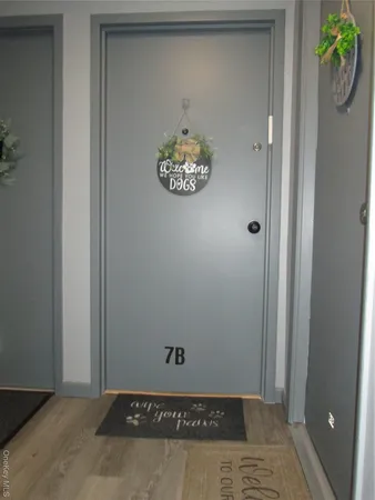 view of a hallway with door