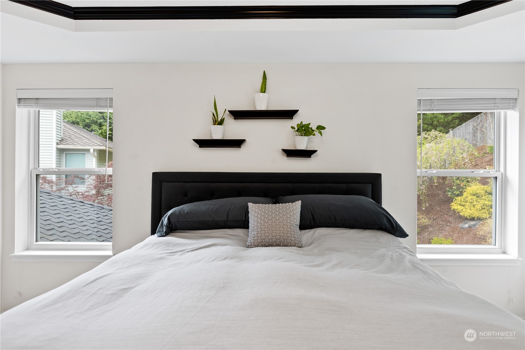 5316 152nd Place Southeast Everett, WA 98208 - Photo 28 of 37 a bedroom with a large bed and a window