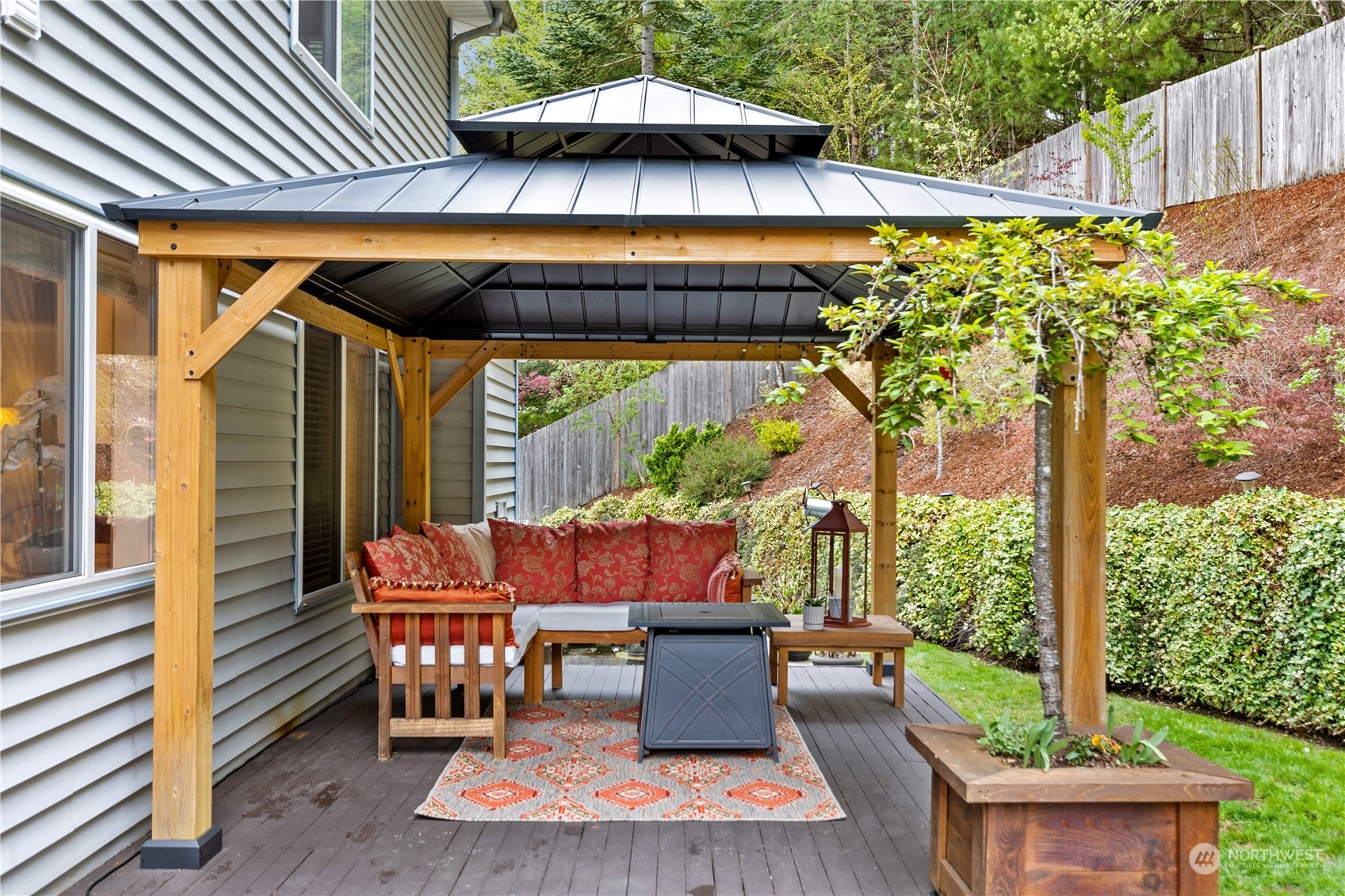5316 152nd Place Southeast Everett, WA 98208 - Photo 34 of 37 an outdoor sitting area with furniture and wooden deck