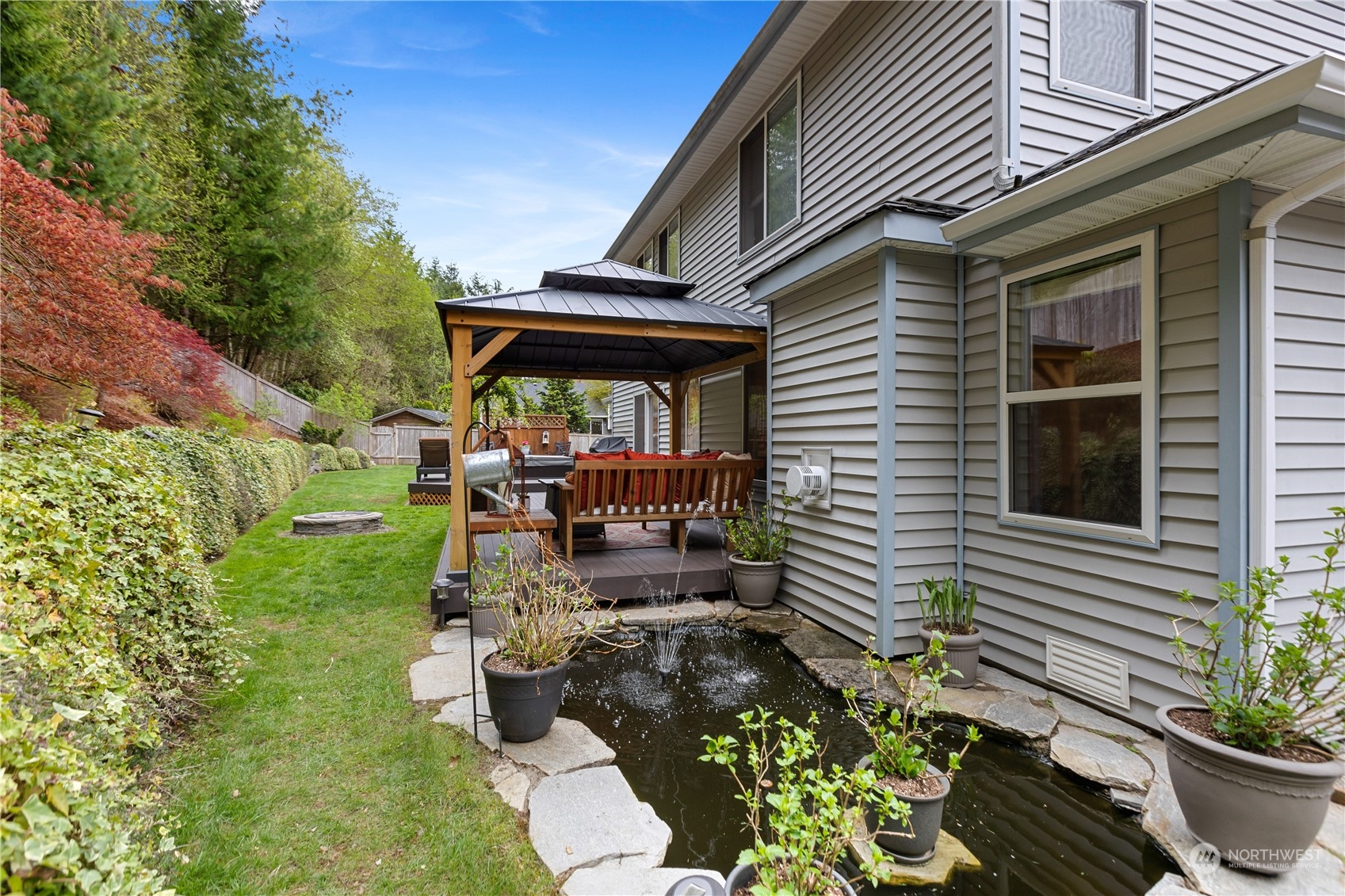 5316 152nd Place Southeast Everett, WA 98208 - Photo 35 of 37 a front view of a house with garden