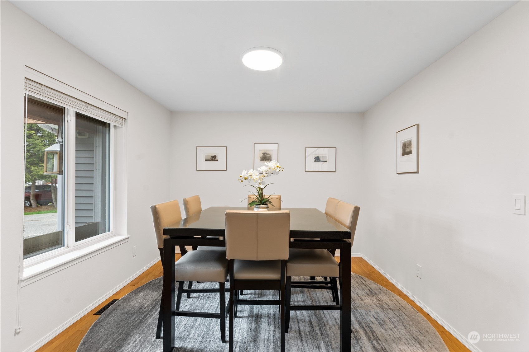 5316 152nd Place Southeast Everett, WA 98208 - Photo 6 of 37 a view of a dining room with furniture and window