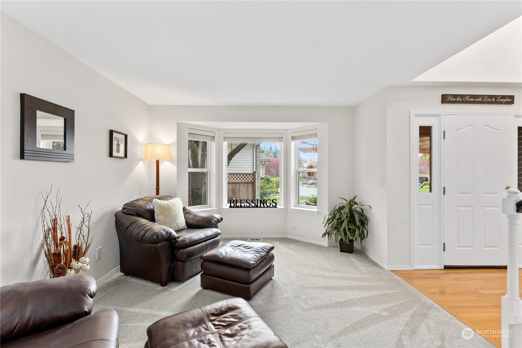 5316 152nd Place Southeast Everett, WA 98208 - Photo 7 of 37 a bedroom with furniture and a potted plant