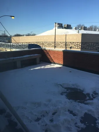 a view of swimming pool with outdoor seating