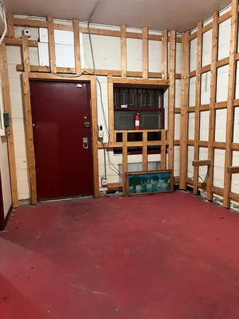 an empty room with windows