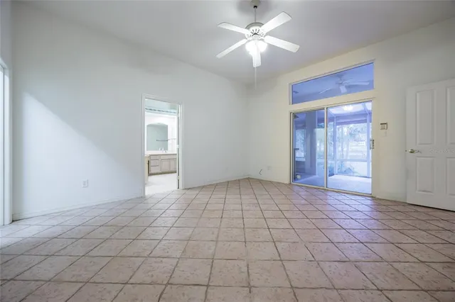 a bathroom with a shower and a mirror