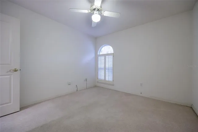 an empty room that has a window