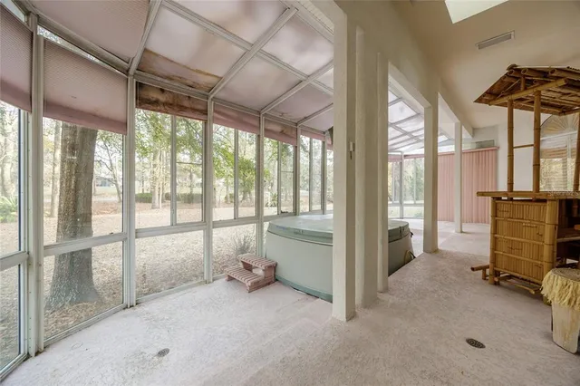 a view of a park with large trees