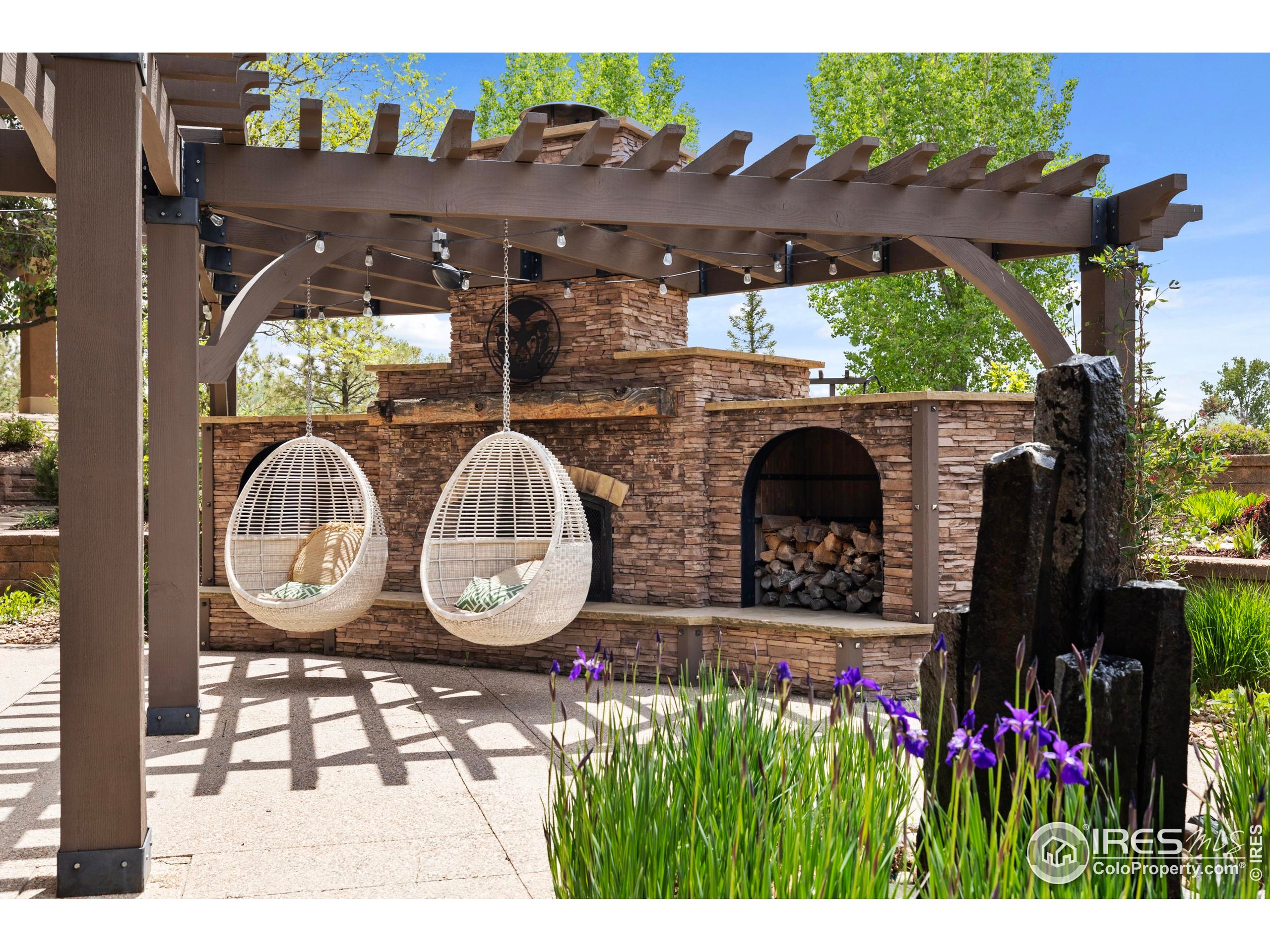 863 Riparian Way Fort Collins, CO 80524 - Photo 36 of 38 a front view of a house with garden