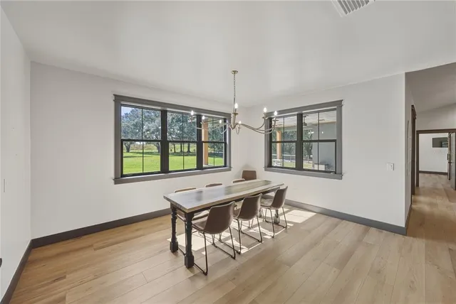 a bathroom with a sink double vanity and a mirror