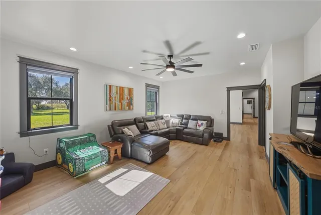 a bathroom with a sink toilet and a mirror