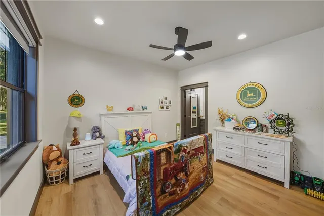 a building outdoor space with patio furniture and potted plants