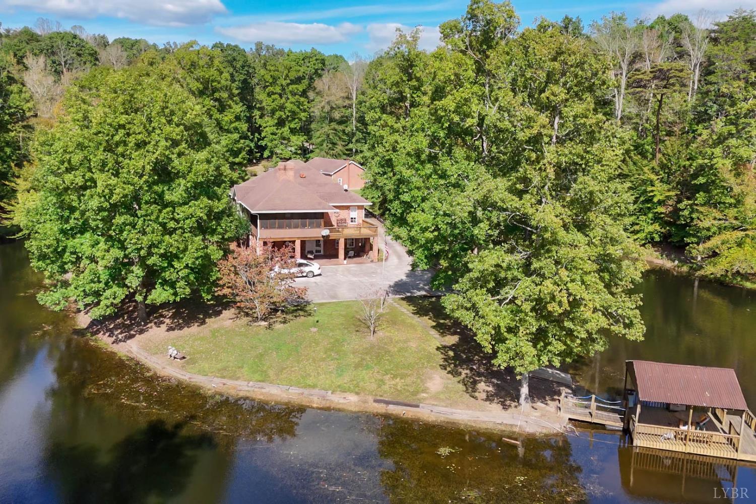 224 Walnut Road Danville, VA 24541 - Photo 2 of 54 an aerial view of a house with swimming pool outdoor seating and yard