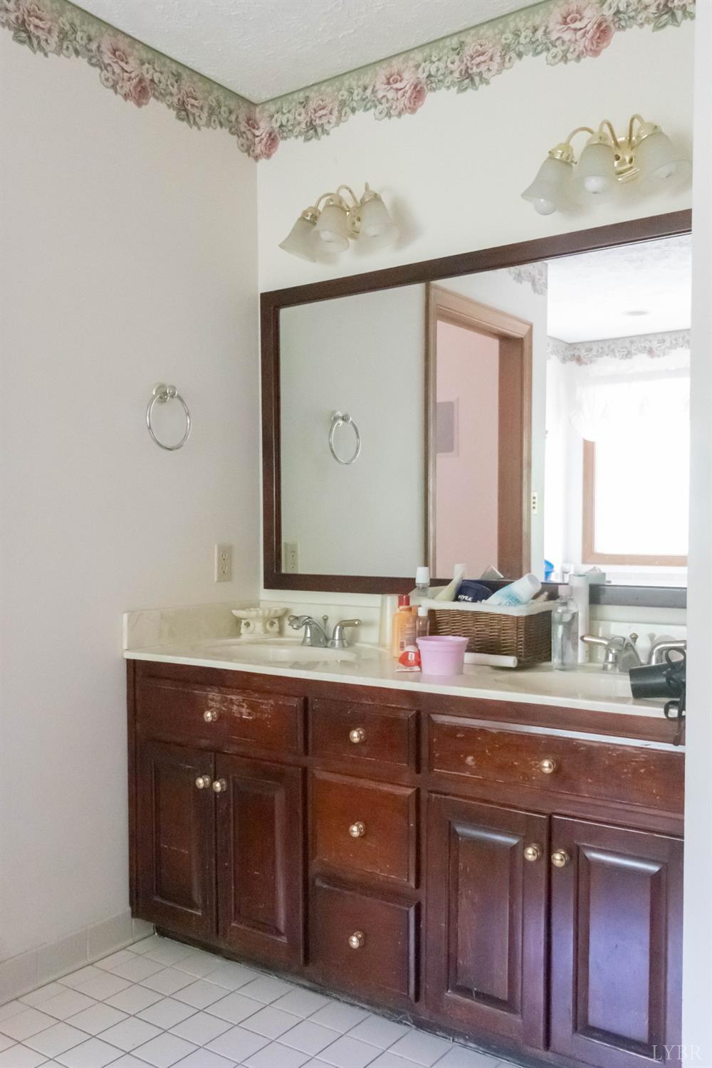 224 Walnut Road Danville, VA 24541 - Photo 22 of 54 a bathroom with a double vanity sink and a mirror