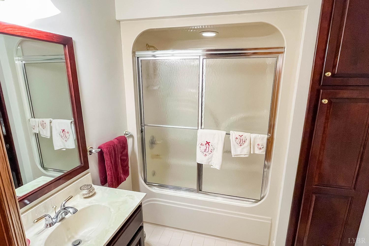 224 Walnut Road Danville, VA 24541 - Photo 24 of 54 a bathroom with a tub and a sink