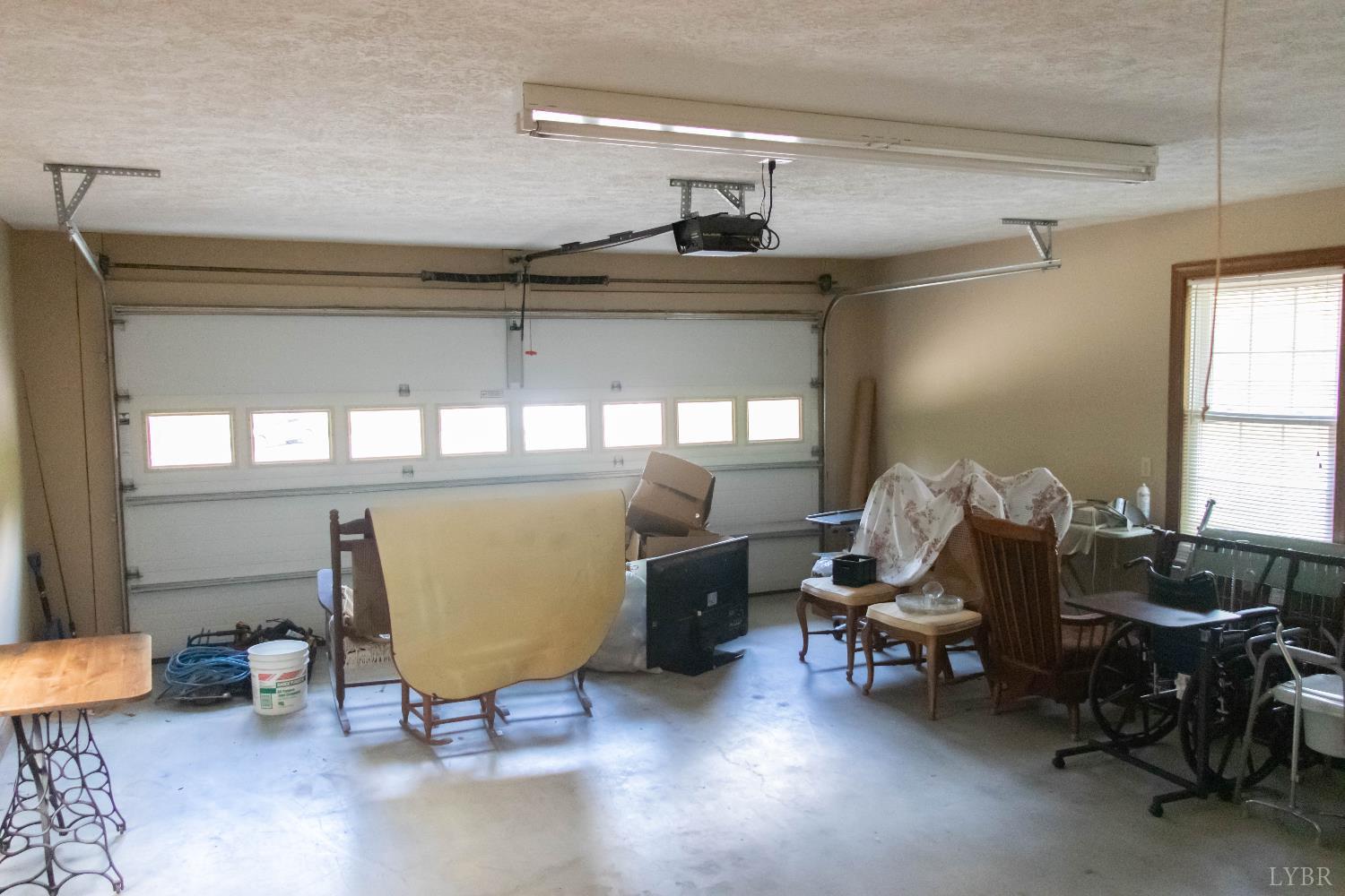 224 Walnut Road Danville, VA 24541 - Photo 26 of 54 a living room with furniture and a window