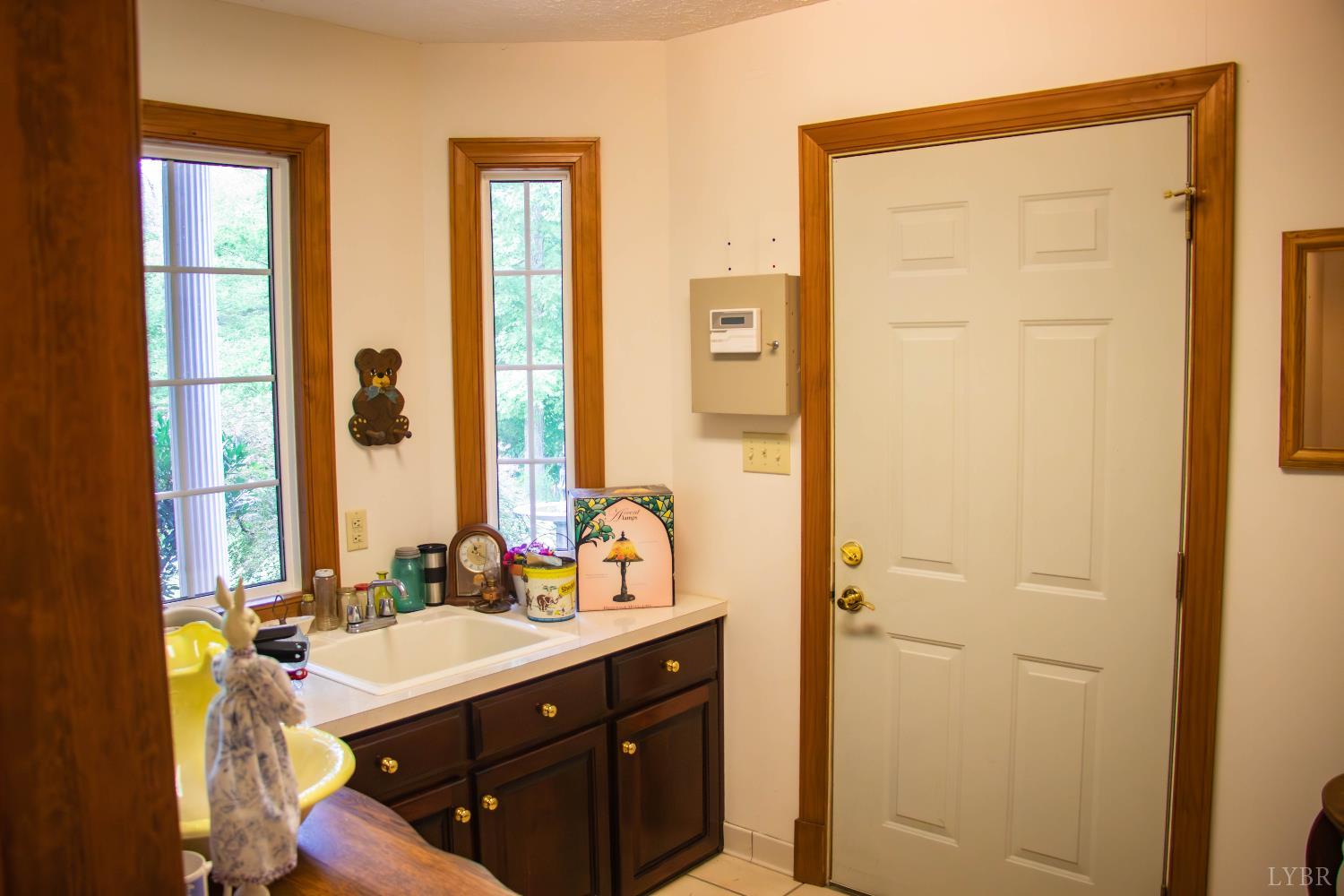 224 Walnut Road Danville, VA 24541 - Photo 27 of 54 a bathroom with a sink double vanity and a mirror