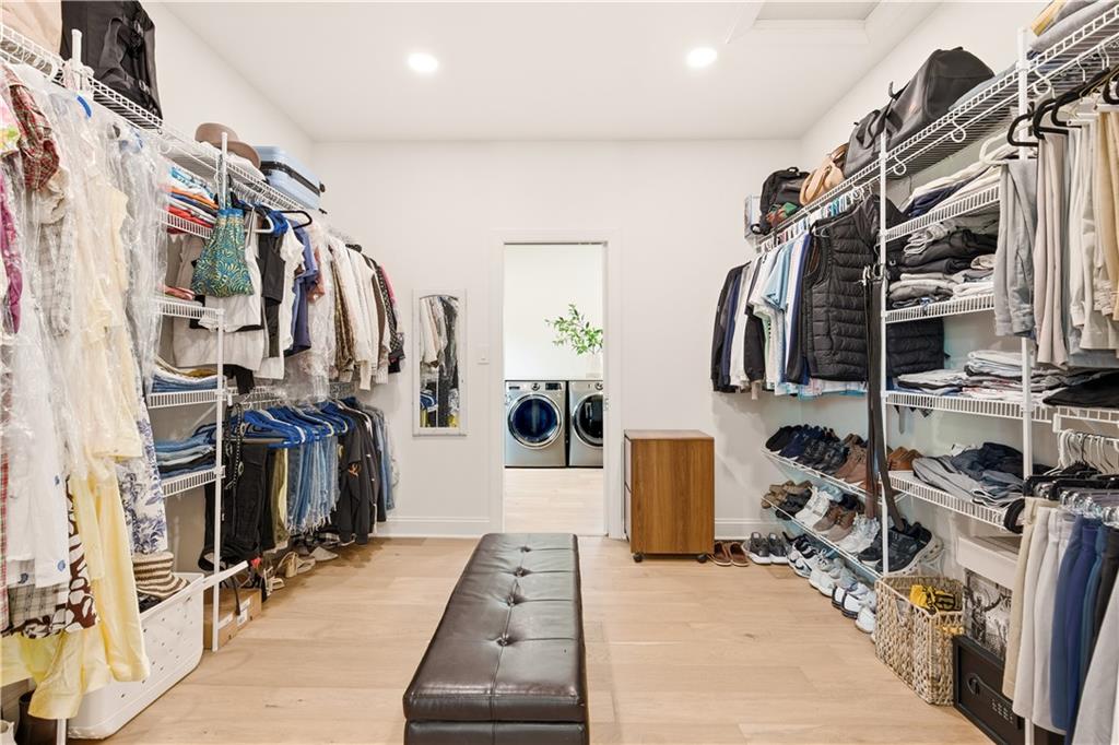 315 Stewarton Road Mill Run, PA 15464 - Photo 28 of 47 a view of walk in closet with clothes