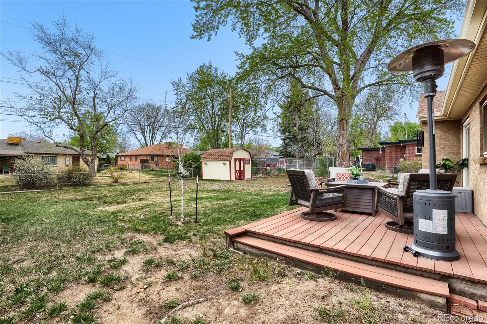 4560 Teller Street Wheat Ridge, CO 80033 - Photo 23 of 25 a view of a backyard with sitting area