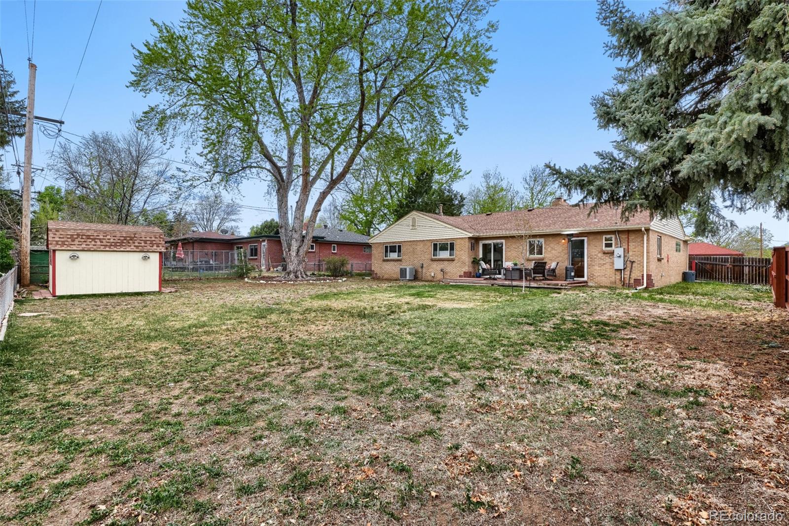 4560 Teller Street Wheat Ridge, CO 80033 - Photo 24 of 25 a house view with a garden space