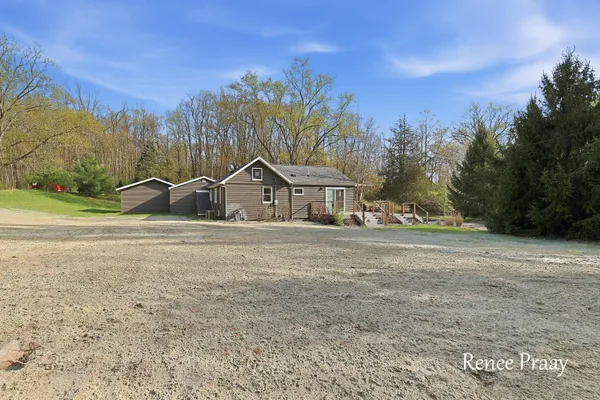 $529,900 | 8619 Fulton Street East, Ada, MI 49301