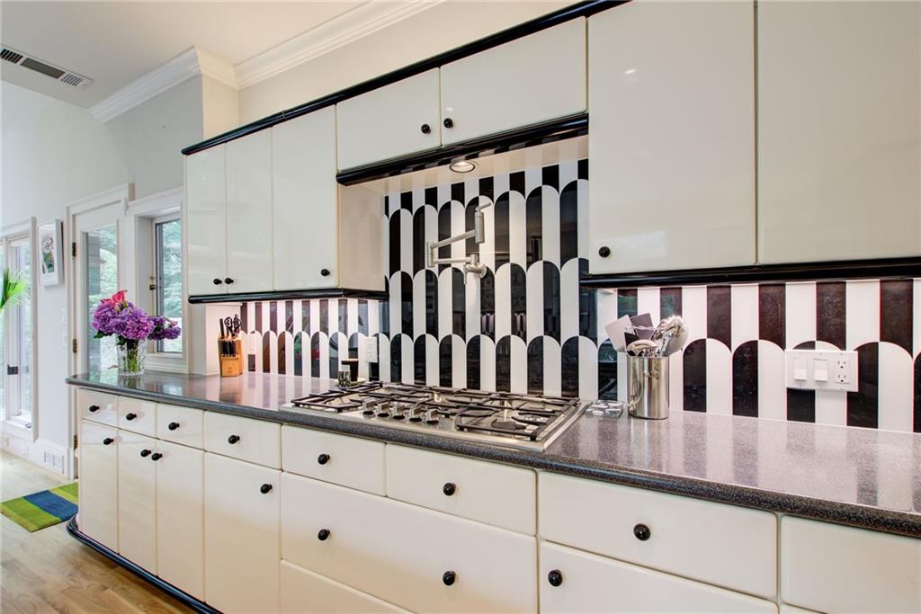 115 Cross Roads Court Atlanta, GA 30327 - Photo 12 of 55 a view of a porch with wooden floor