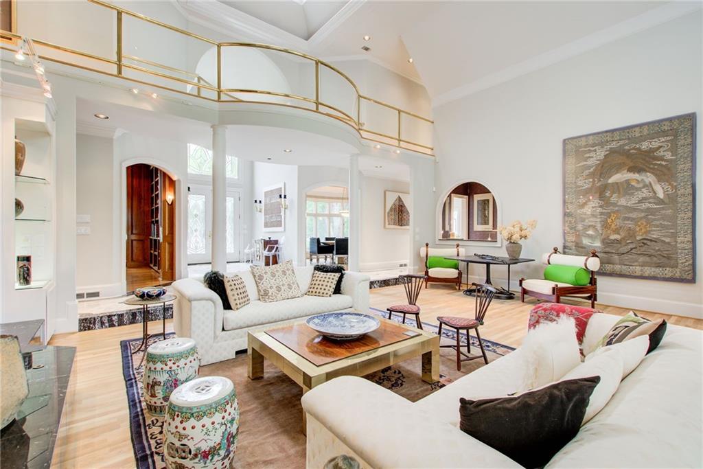115 Cross Roads Court Atlanta, GA 30327 - Photo 18 of 55 a living room with furniture a rug and white walls