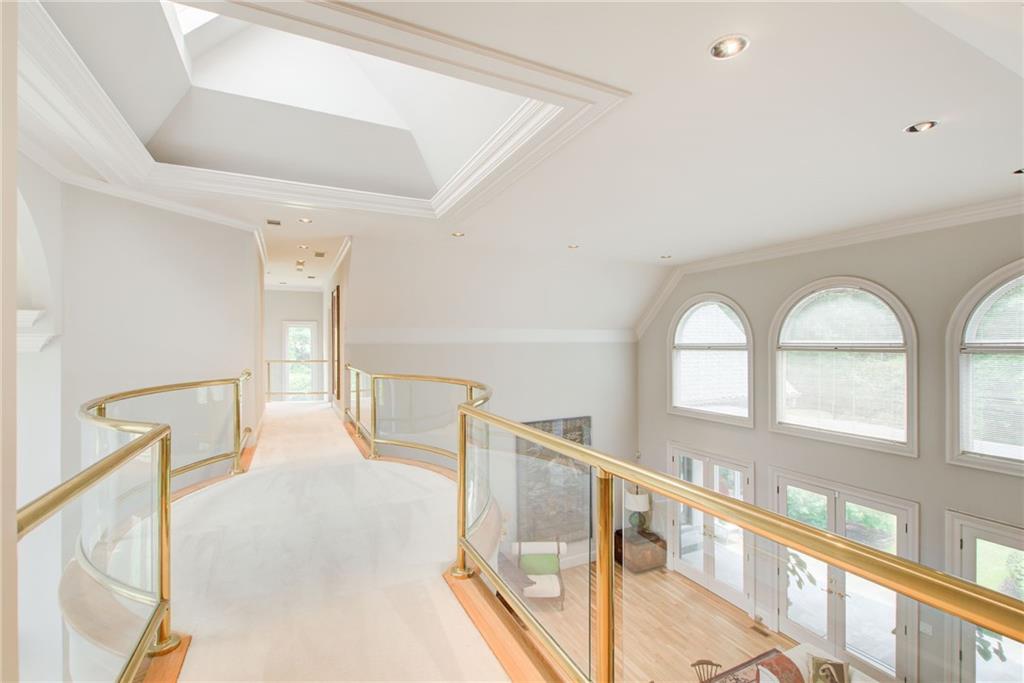 115 Cross Roads Court Atlanta, GA 30327 - Photo 28 of 55 a view of an entryway with staircase