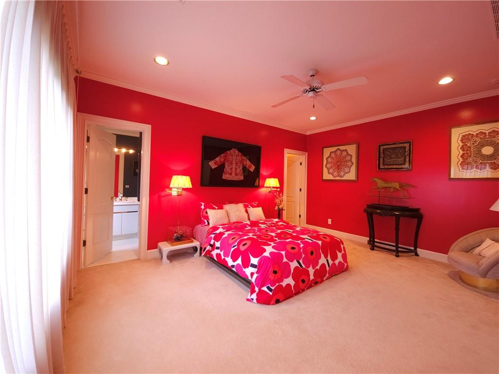 115 Cross Roads Court Atlanta, GA 30327 - Photo 29 of 55 a bedroom with a bed and a ceiling fan