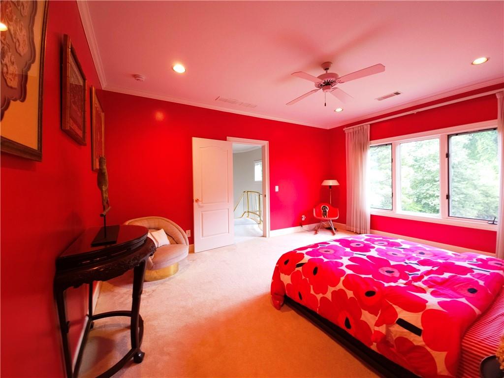 115 Cross Roads Court Atlanta, GA 30327 - Photo 30 of 55 a bedroom with a bed and window