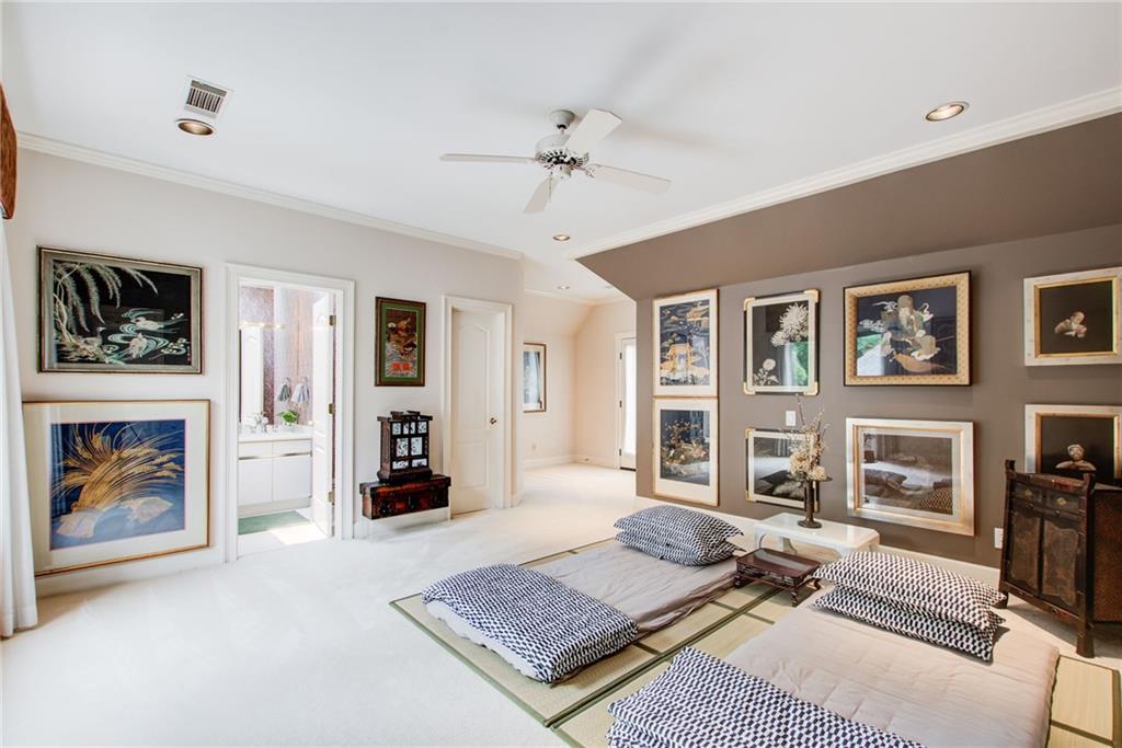115 Cross Roads Court Atlanta, GA 30327 - Photo 36 of 55 a living room with furniture and a fireplace