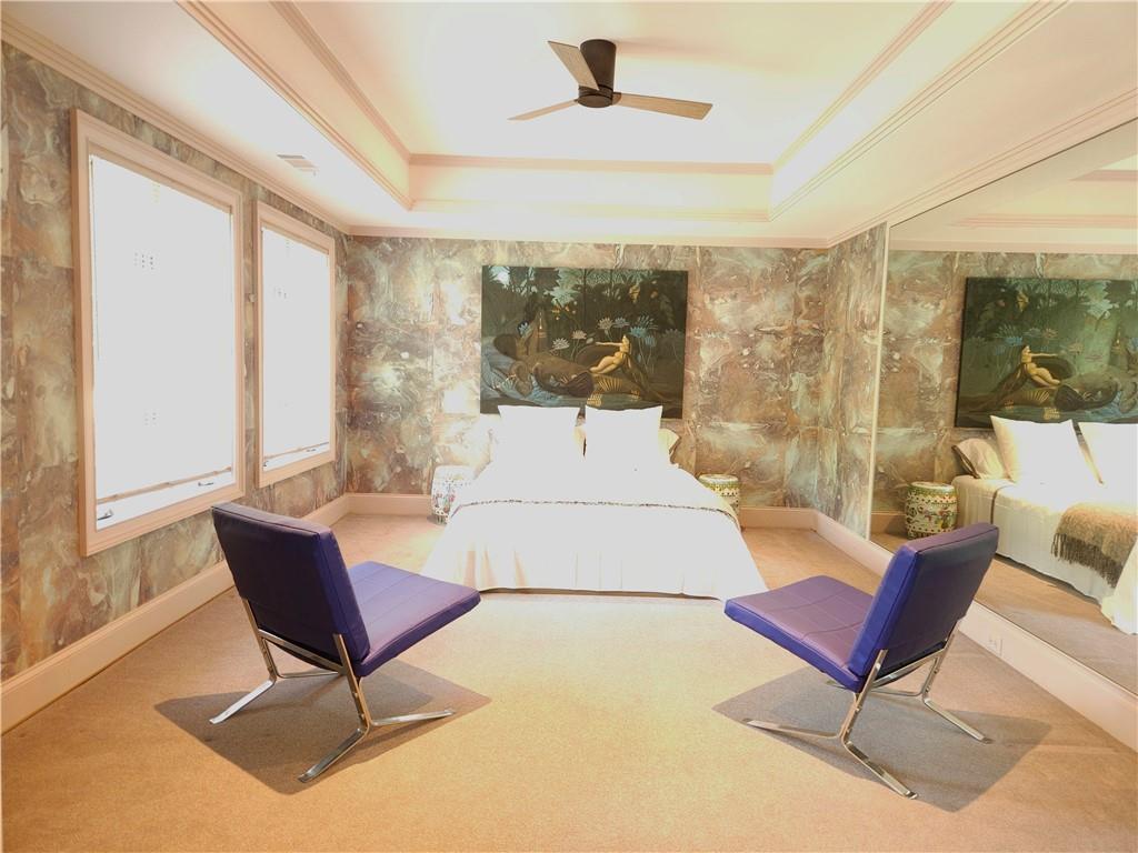 115 Cross Roads Court Atlanta, GA 30327 - Photo 40 of 55 a living room with furniture and a large window