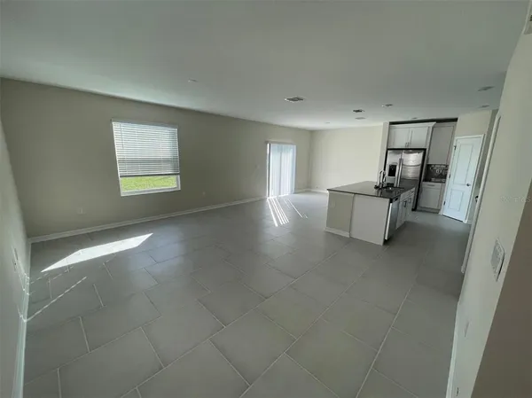 a view of livingroom with furniture and window