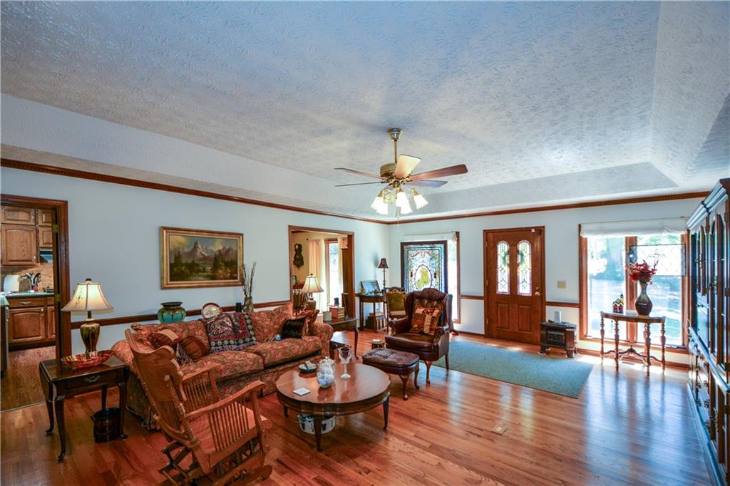 130 Hawn Road Fayetteville, GA 30215 - Photo 6 of 67 a living room with furniture kitchen view and a window