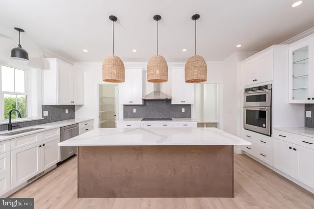 a view of a kitchen with appliances and cabinets
