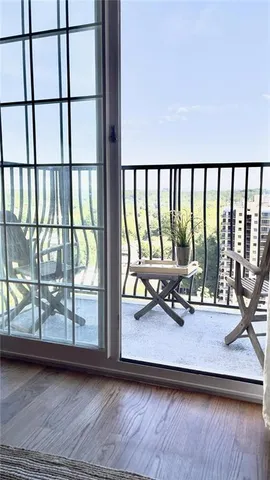 a view of a balcony with an outdoor space